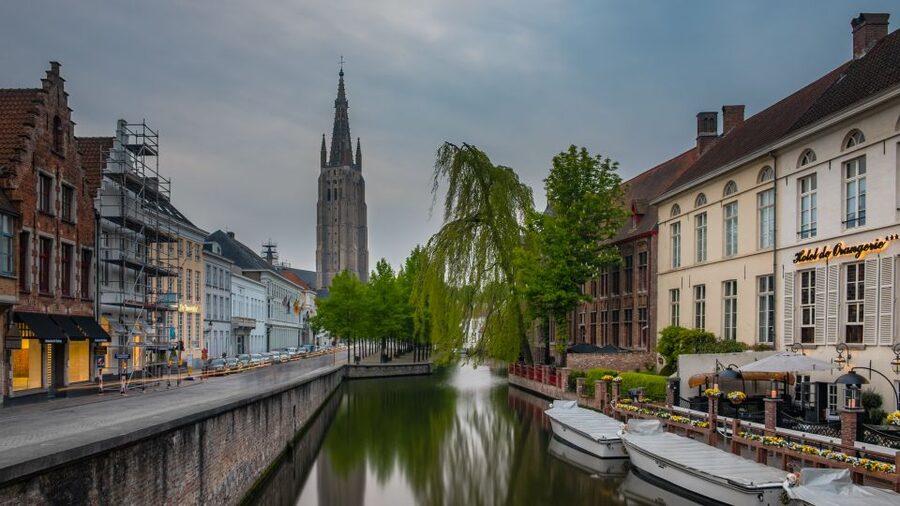 Bruges: Guided Tour & Boat Ride with Optional Beer Tasting - Bruges from the pavement, then from the canal