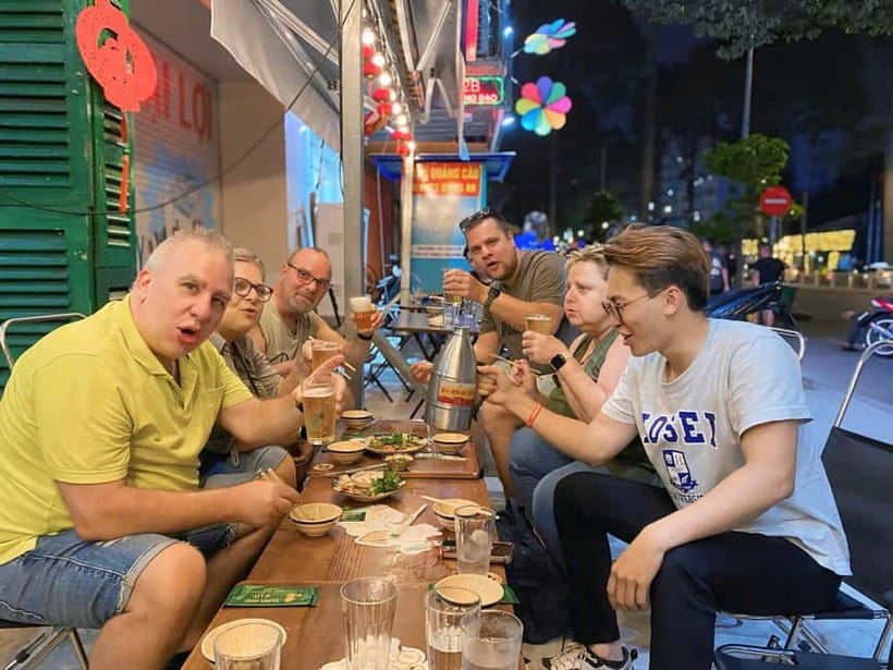 Ho Chi Minh City: Craft Beer and Local Food Tour by Scooter - Riding through Ho Chi Minh City after dark
