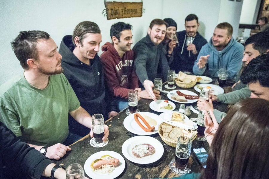 Prague: Castle Side Breweries & Pubs Guided Walking Tour - Charles Bridge to Malá Strana after dark