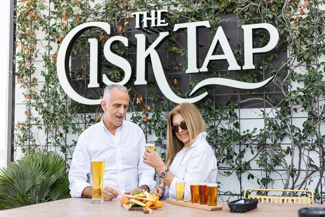 The Farsons Brewery Experience Entry Ticket and Beer Flight - The beer flight, pint, and rooftop Cisk Tap